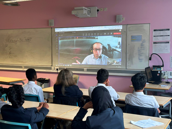 Students during a Q&A session with Famil Ismailov, News Editor for BBC News Russia, in July 2023
