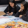 Students engaged in the basketball-themed board game during the Power of 6 Project, July 2023