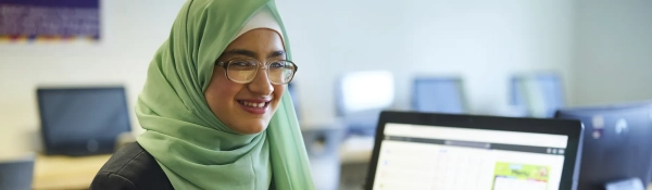 Student revising in an IT suite